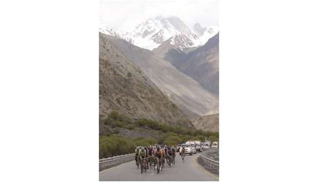 PICTURESQUE: Pakistani and international cyclists during the Tour de Khunjerab, one of the worldu2019s highest altitude cycling competitions, near the Pakistan-China Khunjerab border. AFP