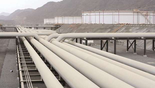 Oil transfer pipes and storage silos are seen at Fujairah port in Fujairah, UAE (file).
