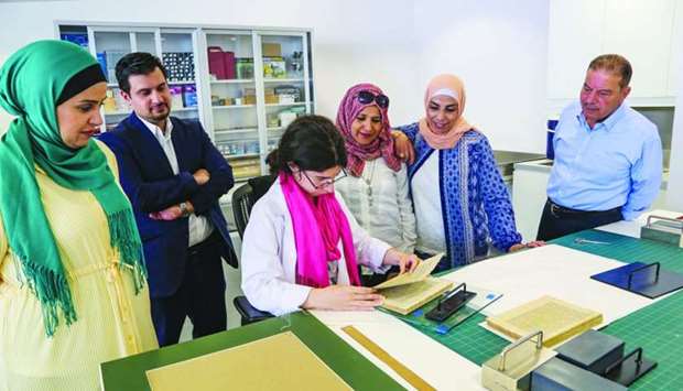Jordanian conservation specialists at the library.
