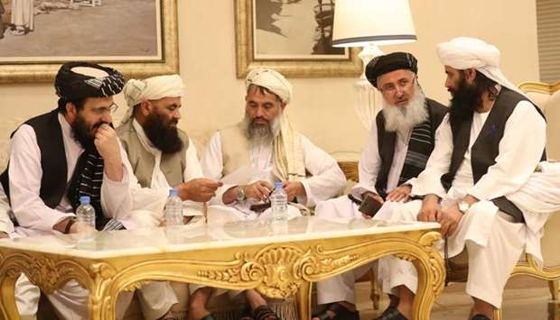 Members of Afghan delegations gather during the second day of the Intra Afghan Dialogue talks in Doha. AFP