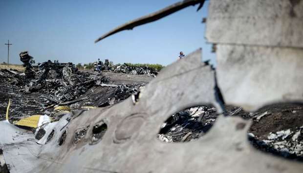In this file photo taken on August 02, 2014 A part of the Malaysia Airlines Flight MH17 at the crash site in the village of Hrabove (Grabovo), some 80km east of Donetsk.