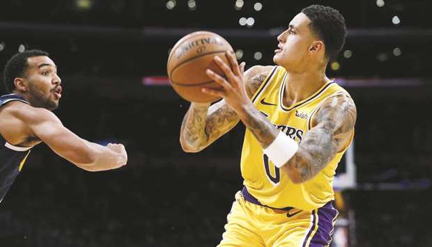 Los Angeles Lakers forward Kyle Kuzma (right) in action against the Orlando Magic during a regular NBA game at Staples Center on January 15, 2020. (TNS)