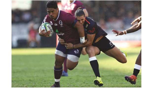 A last-gasp try from the Queensland Redsu2019 Alex Mafi saw the game against Melbourne Rebels tied at full-time. (AFP)