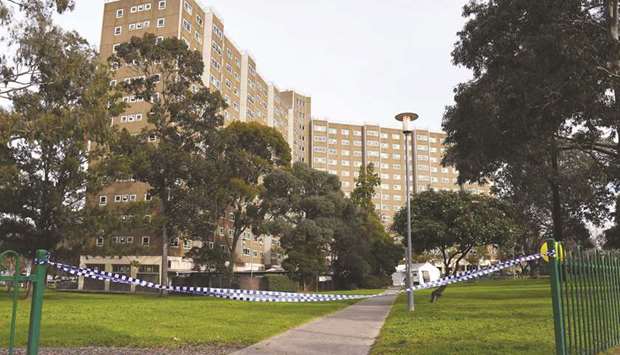 Police tape blocks an entrance at a public housing estate which is undergoing a forced lockdown in Melbourne yesterday as the city records another 288 new cases in a fresh outbreak of the coronavirus.