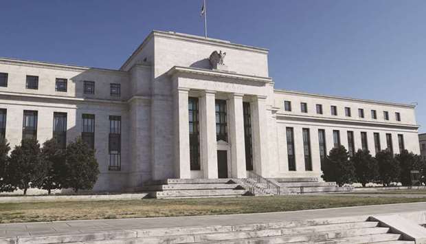 The Federal Reserve building in Washington. The Fed is providing unprecedented support for company debt, while investors outside the US are pouring into corporate bonds.