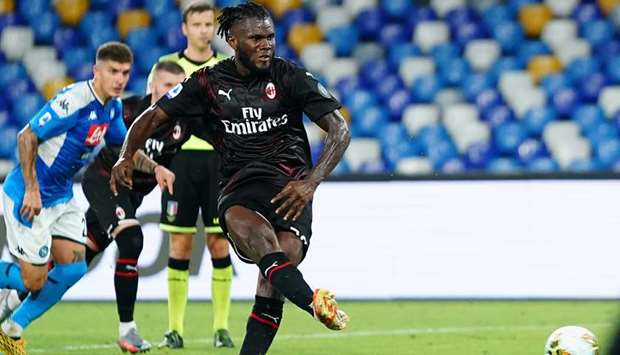 AC Milan midfielder Franck Kessie scores from a penalty against Napoli during the Serie A match on Sunday.