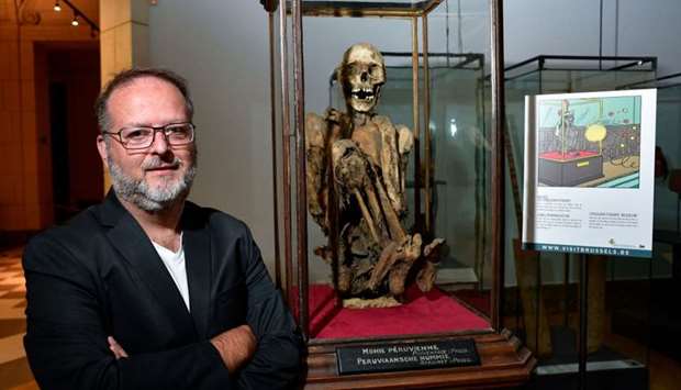 Serge Lemaitre, archaeologist and curator of the Americas collections at the Royal Museums of Art and History in Brussels poses on July 13 during a interview about the Inca mummy that allegedly inspired Herge for his character Rascar Capac, hero of the Tintin album ,The Seven Crystal Balls.,