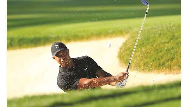 Tiger Woods plays a shot during a practice round prior to The Memorial Tournament at Muirfield Village Golf Club in Dublin, Ohio, yesterday. (Getty Images/AFP)
