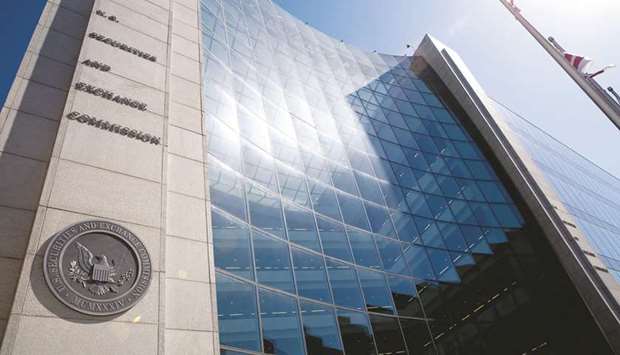 The Securities and Exchange Commission stands in Washington, DC (file). The SEC amended rules last year to allow all companies to have virtual meetings, which were previously only available to emerging growth companies.
