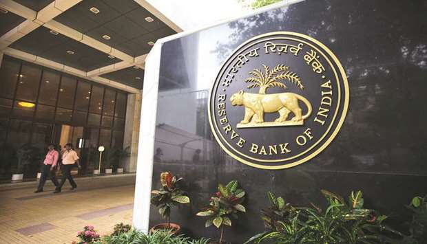 Reserve Bank of India signage is displayed at the entrance to the banku2019s headquarters in Mumbai.