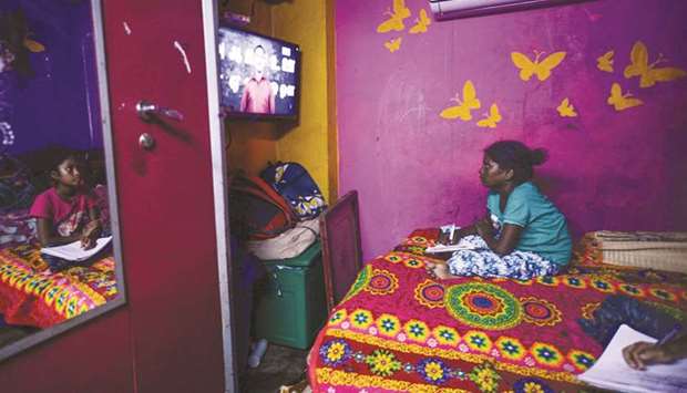 Children attend a tele-learning class at their home displayed on Kalvi TV channel, an education tele-learning initiative set up by the Department of School Education to allow students from class 2 to 10 to continue with their curriculums as schools remain closed, in Chennai yesterday.