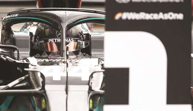 Mercedesu2019 Lewis Hamilton drives into the parc ferme after qualifying in pole position for the Hungarian Grand Prix at the Hungaroring in Budapest yesterday. (Reuters)