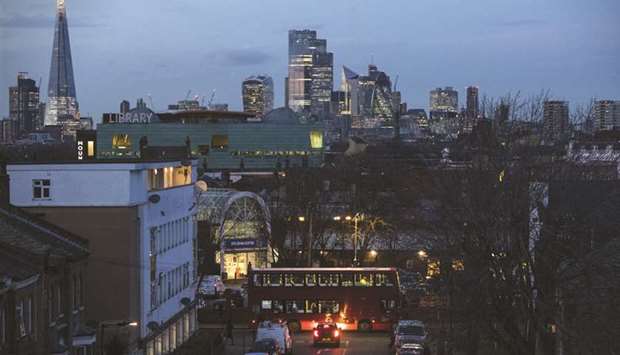 Skyscrapers dominate the skyline in the City of London. The UK now pays less on its debt than its Japanese peers, the latest sign investors are betting on further interest-rate cuts to stave off a deep recession.