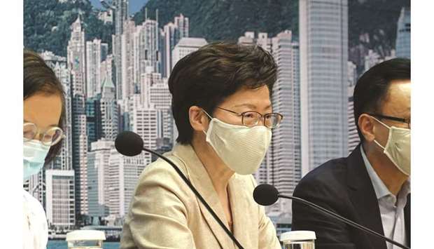 Carrie Lam wearing a protective mask speaks during a news conference following the outbreak of the coronavirus disease (Covid-19), in Hong Kong yesterday.