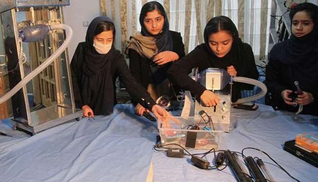 Members of an Afghan all-female robotics team work on an open-source and low-cost ventilator, during the coronavirus disease  outbreak in Herat Province, Afghanistan