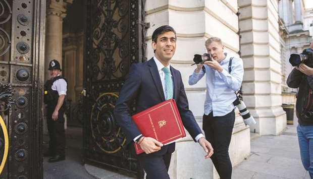 Rishi Sunak, UK Chancellor of the Exchequer, walks in Downing Street in London. Last week Sunak set out up to u00a330bn of new measures, partly to encourage businesses to take workers back when he ends a furlough scheme supporting more than 9mn jobs in October.