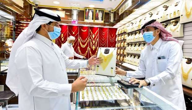 A number of commercial and leisure activities resumed and various places of public interest reopened around the country yesterday. A moment from Gold Souq in Souq Najada. PICTURE: Noushad Thekkayil