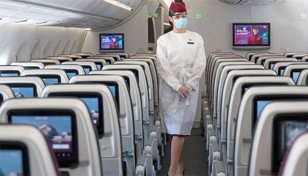 Qatar Airways introduced new disposable protective gowns for cabin crew that are fitted over their uniforms, in addition to safety glasses, gloves and a mask.