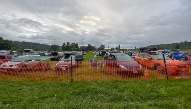 THE SHOW MUST GO ON: Roughly 130 carloads of music fans attended one of Washingtonu2019s first drive-in concerts on July 11 on a Carnation farm.