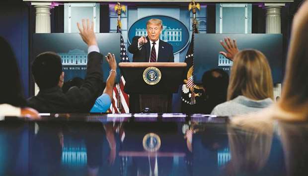 US President Donald Trump gestures as he takes questions during the renewed briefing of the Coronavirus Task Force in the Brady Briefing Room of the White House on July 21, in Washington, DC.