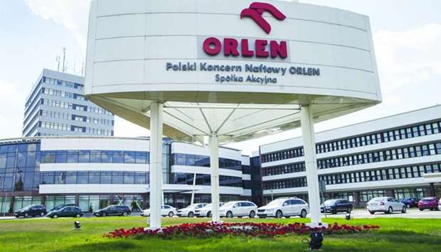 A sign stands outside administrative offices at the PKN Orlen oil refinery in Plock, Poland.