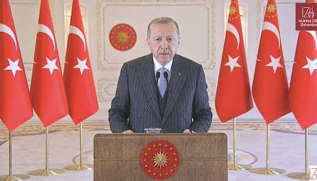 Recep Tayyip Erdogan speaking at the conference.