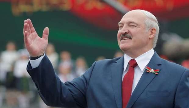Belarusian President Alexander Lukashenko gestures as he takes part in the celebrations of Independence Day in Minsk, Belarus July 3