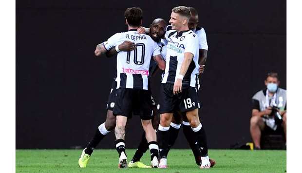 Udineseu2019s Seko Fofana (second left) celebrates with teammates after scoring against  Juventus in the Serie A at Udine, Italy, yesterday. (Reuters)