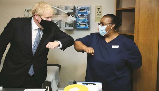 Prime Minister Boris Johnson visits the Tollgate Medical Centre in Beckton, London, yesterday.