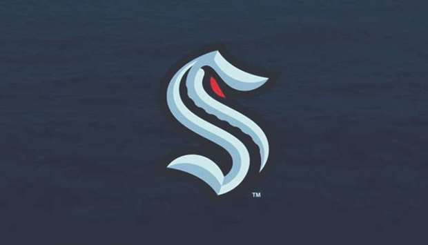 The primary logo is a brighter blue u201cSu201d on a navy background, with a tentacled arm reaching up through the u201cSu201d and a red eye tucked in the upper curve.