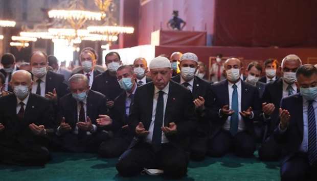 Turkish President Tayyip Erdogan and invited guests attending Friday prayers at Hagia Sophia Grand Mosque during its official opening ceremony in Istanbul.