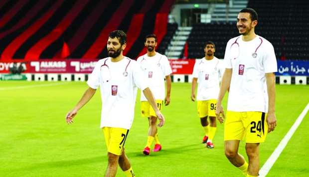 QNB Stars League players warm up wearing special jerseys showing appreciation and gratitude for the efforts of medical staff and all those who have worked on the frontlines to combat the spread of Covid-19, as Qatar's top league got underway with two games Friday.