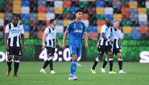 Juventusu2019 Cristiano Ronaldo (centre) looks dejected after the loss to Udinese in the Serie A on Thursday night. (Reuters)