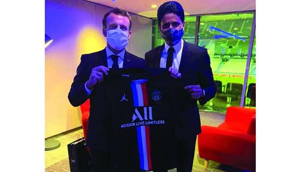 Paris Saint-Germain (PSG) Chairman Nasser al-Khelaifi presented French President Emmanuel Macron with the club's new jersey, signed by PSG stars Kylian Mbappu00e9 and Neymar Jr, marking the club's 50th anniversary. Al-Khelaifi handed over the jersey to Macron during the recent French Cup final, which PSG won 1-0 against Saint-Etienne. Picture courtesy of PSG Twitter page