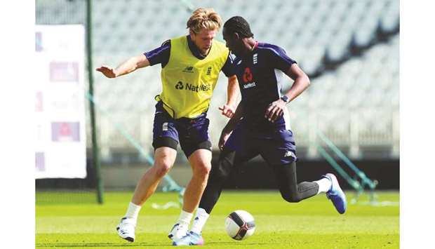 In this May 16, 2019, picture, Englandu2019s David Willey (left) and Jofra Archer play football during a training session at Trent Bridge in Nottingham, United Kingdom. (Reuters)