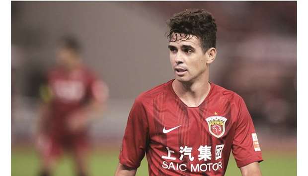 Former Chelsea star Oscar, who currently plays for Shanghai SIPG, has expressed interest in playing for China. (AFP)