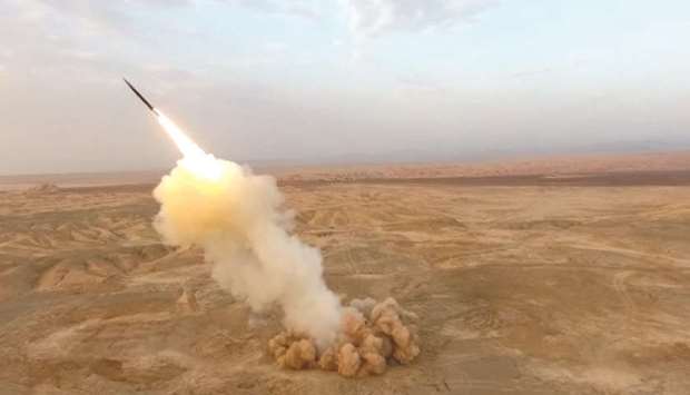 This handout photo provided by Iranu2019s Revolutionary Guard Corps (IRGC) official website via Sepah News, shows ballistic missiles being launched from underground by IRGC during the last day of military exercises near sensitive Gulf waters.