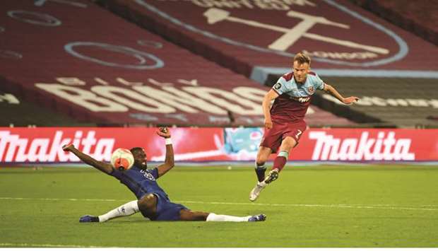 West Ham Unitedu2019s Andriy Yarmolenko (right) scores past Chelseau2019s Antonio Rudiger during the Premier League match. (Reuters)