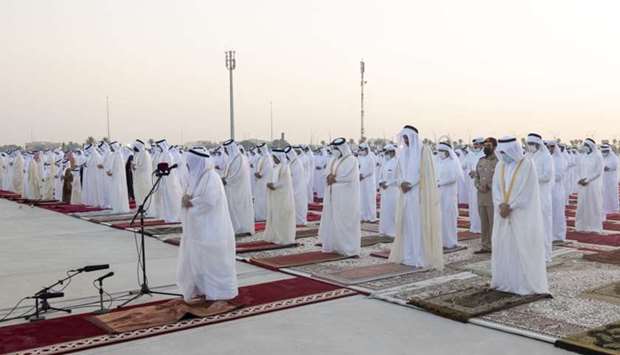 His Highness the Amir Sheikh Tamim bin Hamad Al-Thani performs Eid Al-Adha prayer at Al Wajba praying area.