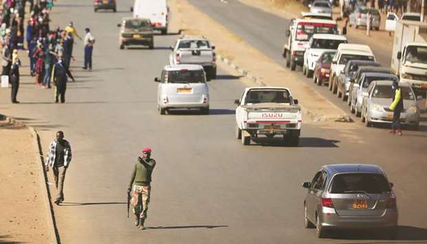 Soldiers patrol the streets ahead of planned anti-government protests during the coronavirus disease outbreak in Harare, Zimbabwe, yesterday.