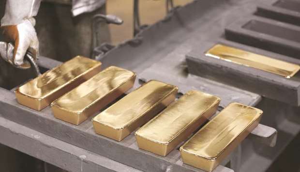 Freshly cast gold ingot bars sit in the foundry at a non-ferrous metals plant in Krasnoyarsk, Russia. CME Group is expanding delivery of its new gold futures contract to London vaults, the latest response to an extreme dislocation between the two most important markets for the precious metal.