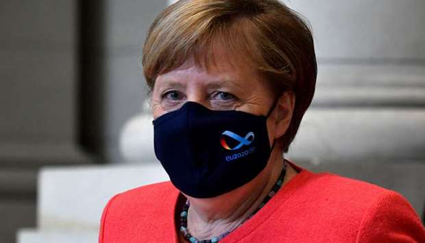 Merkel: had been quizzed earlier in the week on why she hadnu2019t been seen more often with her mouth and nose covered as required under coronavirus rules.