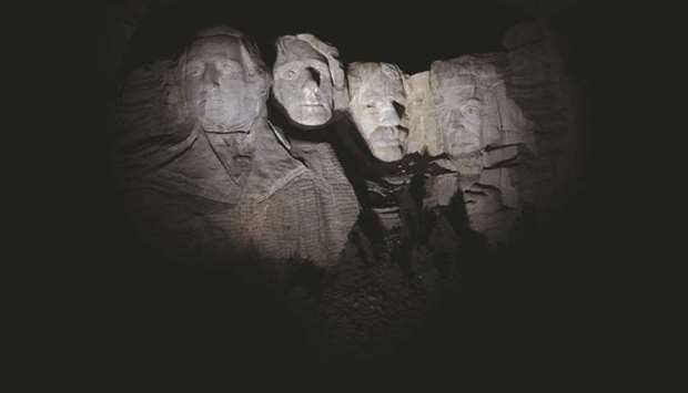 The Mount Rushmore National Monument is seen at night in Keystone, South Dakota late on Thursday. US President Donald Trump was headed to the monument yesterday to watch the first fireworks display at the monument in nearly a decade.