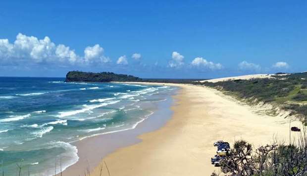 The 36-year-old was bitten on a leg in waters near the popular tourist destination Fraser Island, about 400 kilometres north of Brisbane.