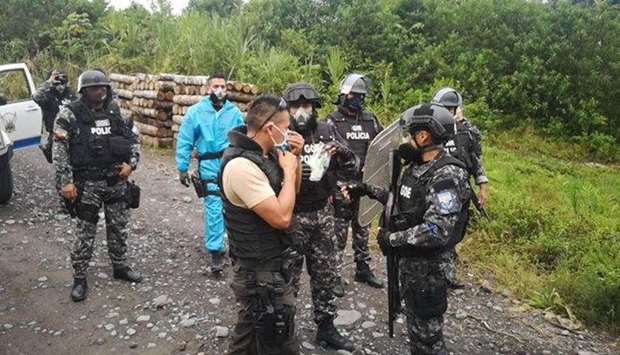 Members of the National Police who participated in the rescue of six people who were being held by the Amazonian tribe members in Kumay near the Peruvian border of  Ecuador. Picture courtesy: El Universo