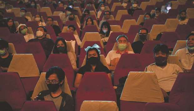 Movie fans gather to bid farewell to the last standalone movie theatre La Scala amid the spread of the coronavirus disease (Covid-19) in Bangkok yesterday.