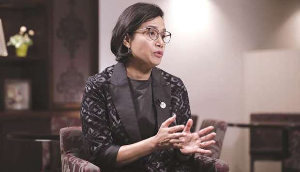 Mulyani Indrawati, Indonesiau2019s Finance Minister, speaks during an interview on the sidelines of the Group of 20 (G20) finance ministers and central bank governors meeting in Fukuoka, Japan. Bank Indonesia will purchase 397.56tn ($27bn) of bonds directly from the government at the benchmark seven-day reverse repurchase rate, Indrawati said in an online briefing yesterday.