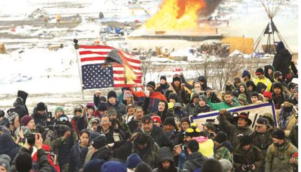 A February 22, 2017, file photo of opponents of the Dakota Access oil  pipeline demonstrating near Cannon Ball, North Dakota.