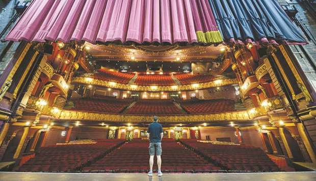 Steve Clarkson, head of maintenance and facilities at the Palace Theatre, inspects the auditorium as he performs his twice-weekly safety check of the theatre whilst it remains closed due to government restrictions in place to suppress the spread of the coronavirus, in Manchester, northern England.
