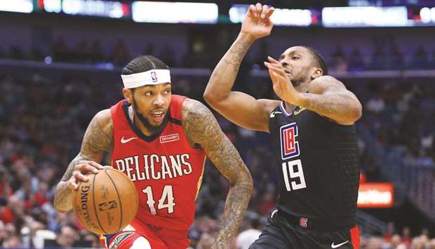 The New Orleans Pelicansu2019 Brandon Ingram (left) in action against the Los Angeles Clippers at the Smoothie King Center in New Orleans on January 18, 2020. (TNS)